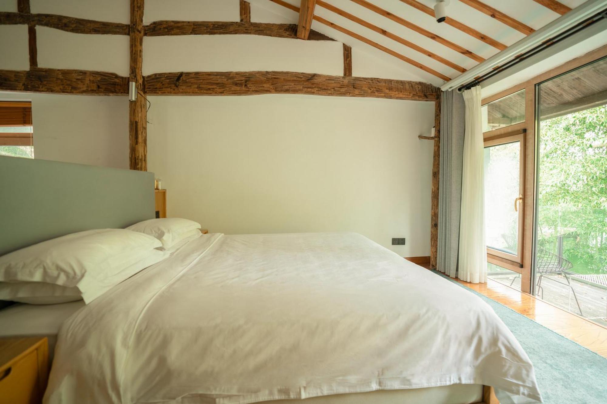 July Bamboo Hostel Deqing Экстерьер фото